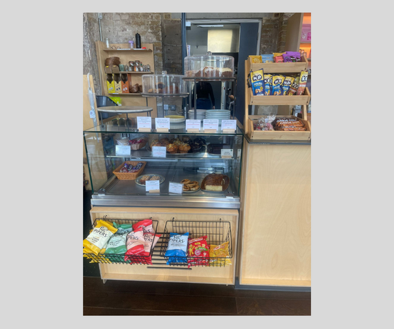 A selection of sandwiches and snacks at the counter of the Visitors' Book Cafe at Woolwich Works