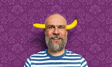 Children's author Olaf Falafel with a banana through his head.