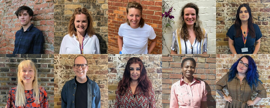 10 square photos of the Woolwich Works team in a 5 by 2 collage. Everyone is standing in front of a brick wall and smiling at the camera.