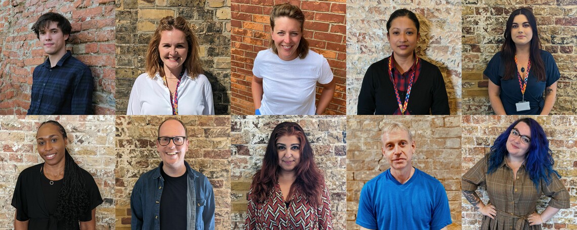 10 square photos of the Woolwich Works team in a 5 by 2 collage. Everyone is standing in front of a brick wall and smiling at the camera.